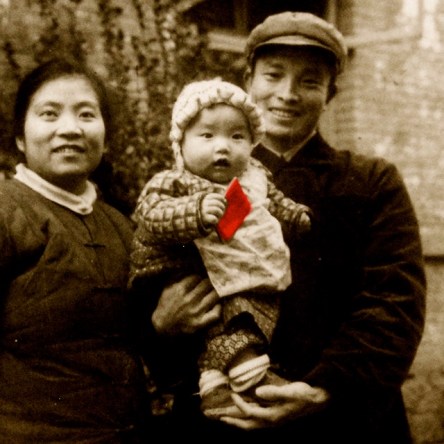 My dad was sent to Xichang, an outpost, to “reform” and “serve the people” when I was born. Dad saw me, his firstborn, for the first time when I was a seven-month-old. The Little Red Book in my hand served as the standard photo pop and rattle for a baby. I looked a little rattled—the photographer was shining too much light on me with a rice-bowl-sized Mao pin.